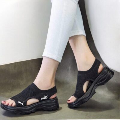 sandalias puma de blanco y negro