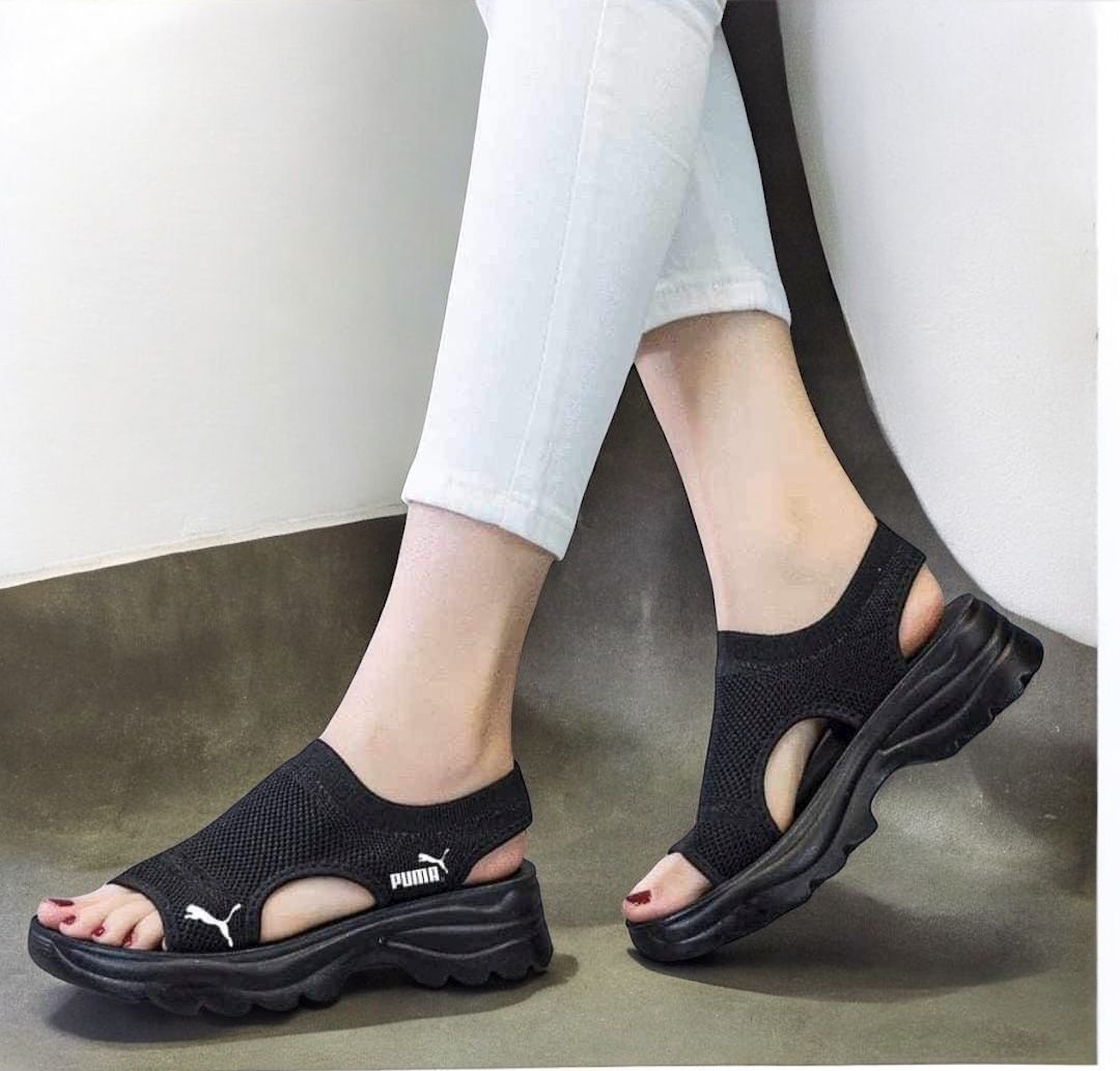 sandalias puma de blanco y negro